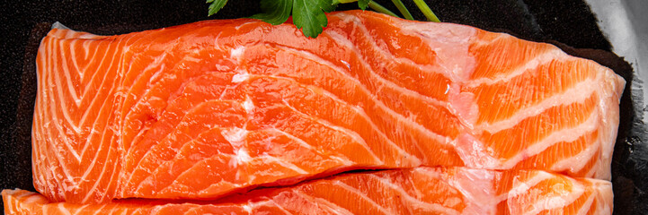 Salmon red fish organic seafood tasty fresh gourmet food background on table rustic food top view copy space
