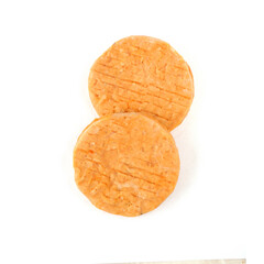 raw fish cutlets on white background