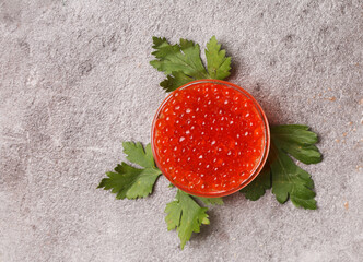 bowl with red caviar and dill