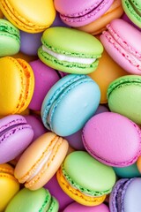 Obraz premium Brightly colored assortment of macarons showcases shades of lavender, mint green, lemon yellow, and raspberry red in a circular arrangement for a vibrant dessert display