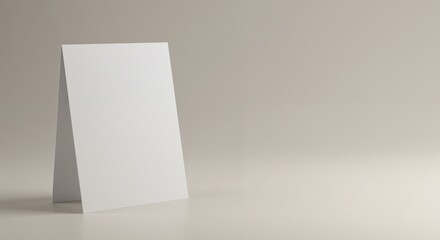 Fototapeta premium Blank standing card on a minimalistic background reflecting simplicity and clarity representing the concept of planning for events or announcements