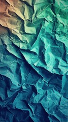Distressed crumpled turquoise paper, rough abstract grunge texture, creased backdrop, textured surface with a gradient from brown, green to deep blue.