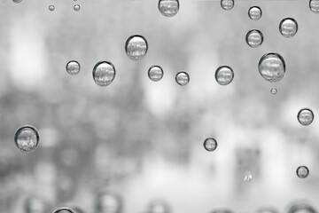 Soda water with bubbles of gas in glass, closeup