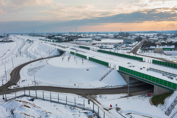 The new Tricity Metropolitan ring road in Miszewo at winter sunset. Poland