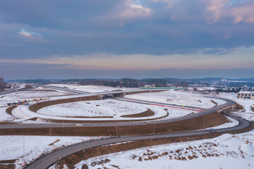 The new Tricity Metropolitan ring road in Chwaszczyno at winter sunset. Poland