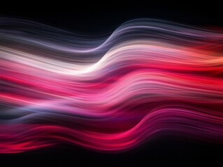 Dynamic curves of red and gray lights weave through a dark background