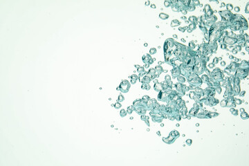 Obraz premium Many water bubbles on light background, closeup. Space for text