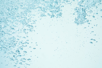 Many water bubbles on light background, closeup