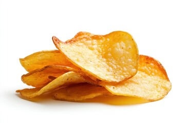 Crispy yellow potato chips are stacked together against a bright white background, highlighting their appealing golden hue and texture