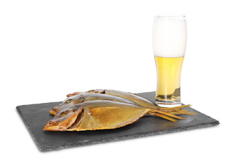 Glass of beer and dried fish isolated on white