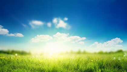 a fresh spring blue sunny sky background with blurred warm sunny glow