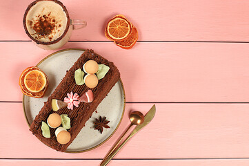 Homemade delicious tiramisu, sponge cake or cake with sweet jam, cream, nuts, cinnamon and milk drink eggnog with cocoa. Concept of modern bakery, festive treat and advertising for cafe and restaurant