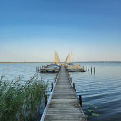 A Serene Dock Overlooking Water Under a Clear and Beautiful Sky That Inspires Peacefulness...