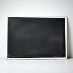 Fototapeta premium Large white blackboard with smooth surface on clean backdrop, ideal for creative ideas and presentations