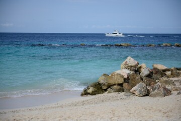 Beach Rocks and a Jacht boat