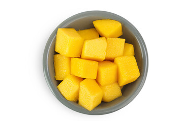 mango diced in ceramic bowl isolated on white background. Top view. Flat lay