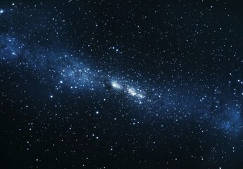 Obraz premium A stunning view of the Milky Way galaxy stretching across a dark night sky filled with countless stars.