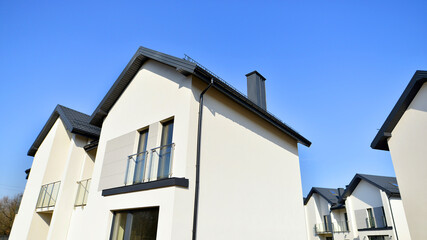 The real estate market in the suburbs. New single family houses in a new development area....