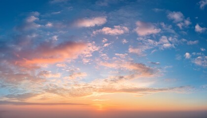 Fototapeta premium background of sunrise sky with gentle colors of soft clouds