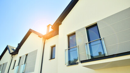 The real estate market in the suburbs. New single family houses in a new development area....