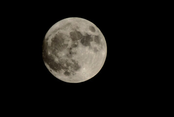 full moon over black