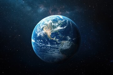Fototapeta premium A blue and green planet seen against a starry background