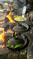 The seller lifted the cooked serabi and ready to eat.Traditional process of cooking 