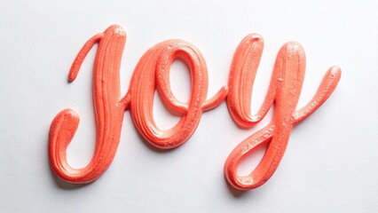 Fototapeta premium Vibrant Coral Joy Hand Lettering - Positive Inspirational Handwritten Typography Stock Photo