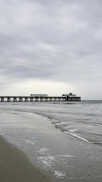 The pier at Folly Beach on a cloudy day