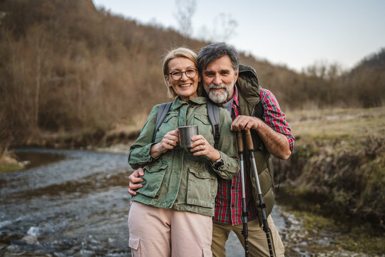 portrait of couple husband and wife hiker enjoy together in nature