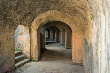 Ancient Stone Archway Corridor in Pompeii, Italy Intriguing Historical Landmark