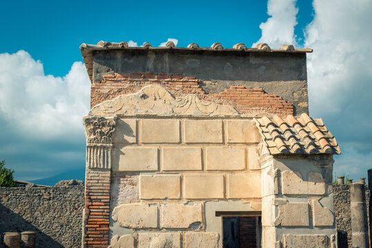 Ancient Stone Building in Pompeii, Italy Under Clear Blue Sky