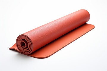 A red yoga mat is rolled up isolated on white background