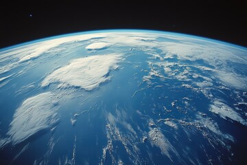 Aerial view of Earth showcasing blue sky and vast landscapes from space.