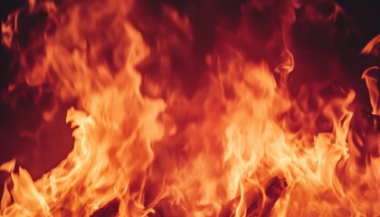 Flames flicker in a dark room, contrasting sharply with the black background.