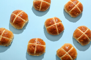 Easter cross buns on blue background