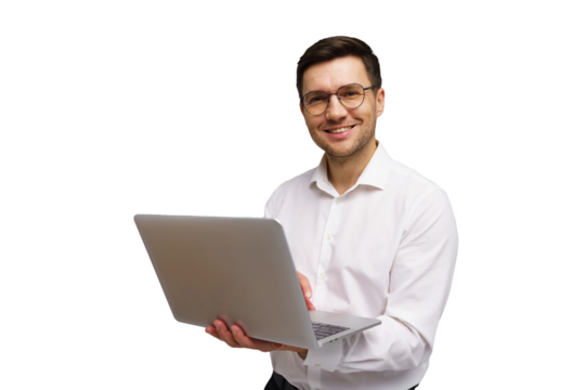 Professional man with glasses smiles while using laptop in a modern environment