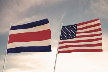 Relations between the countries of the United States of America USA and Costa Rica represented by the concept of two flags waving against a cloudy sky.3d render.