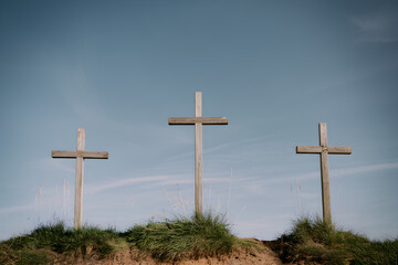 Three Wooden Crosses on a Hill – Easter Symbolism, Christian Faith, Crucifixion of Jesus Christ, Resurrection Sunday, Good Friday, Religious Hope and Salvation, Gospel Concept, Easter Concept