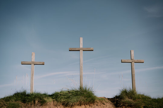 Three Wooden Crosses on a Hill &ndash; Easter Symbolism, Christian Faith, Crucifixion of Jesus Christ, Resurrection Sunday, Good Friday, Religious Hope and Salvation, Gospel Concept, Easter Concept