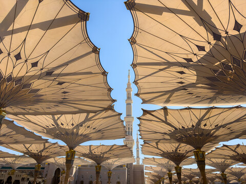 Open Umbrellas and Minaret in Al-Masjid an-Nabawi Courtyard