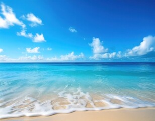 Fototapeta premium tropical beach scene with turquoise water, golden sand, and a clear blue sky, with soft-focus waves gently touching the shore1