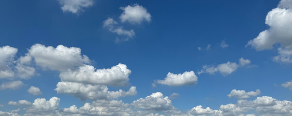 A blue sky with white clouds background material