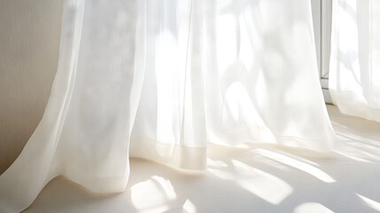 118.Clean and tranquil home interior with sheer white curtains hanging delicately by a tall window, diffusing light and adding a touch of elegance to the minimalist design.