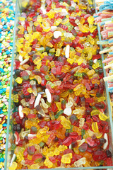 Colorful assortment of gummy candies displayed at a candy shop