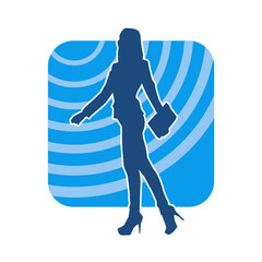Silhouette of a fashionable female carrying briefcase bag. Silhouette of a business woman in pose with her briefcase bag.