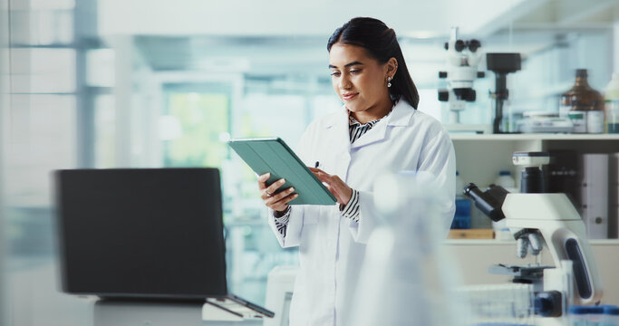 Tablet, woman and scientist in laboratory for research on healthcare innovation with biomedical engineering. Science, digital technology and female chemist working on pharmaceutical immunotherapies.