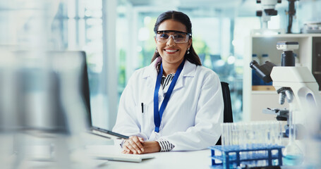 Smile, woman and portrait of scientist with goggles in laboratory for chemical experiment....