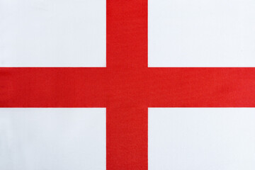 Obraz premium the national flag of England on a dense material close-up