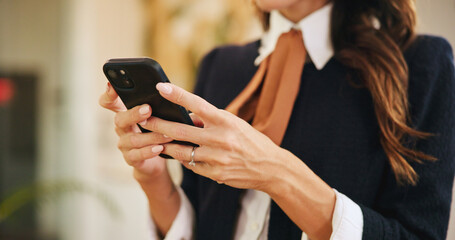 Hands, business woman and phone in hotel for online booking, reservation schedule or information update. Mobile, worker and communication closeup on internet with concierge typing on hospitality app